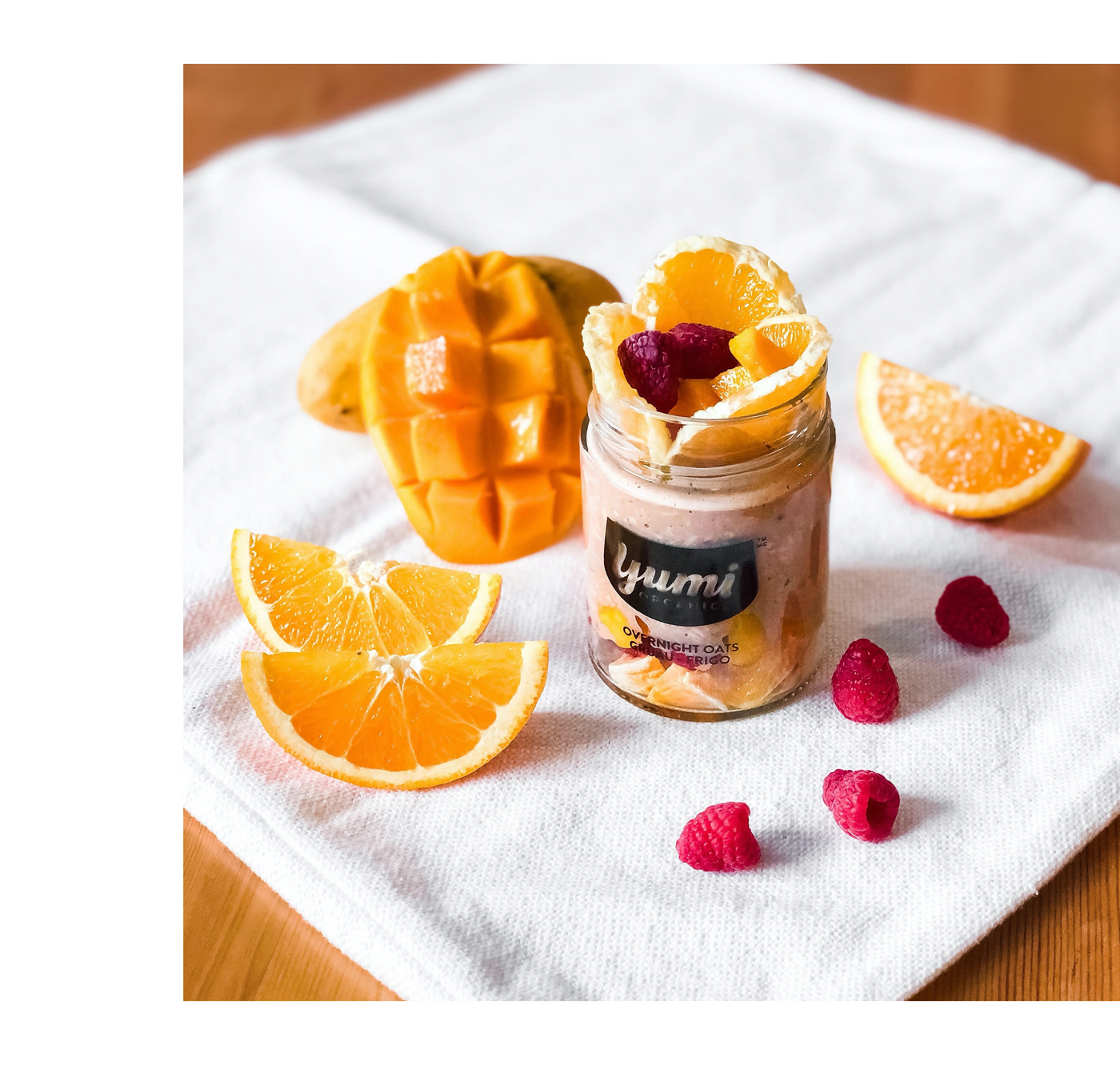 b-vitamin boosting overnight oats with mango raspberries & orange